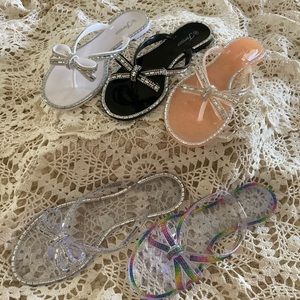 Bow slides in black,white,clear,clear multi,nude